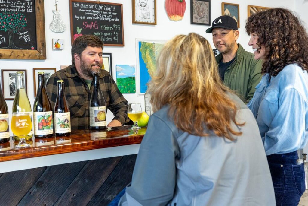 Owner Ben Neilsen with guests at Lassen Cider in Chico near Highway 99