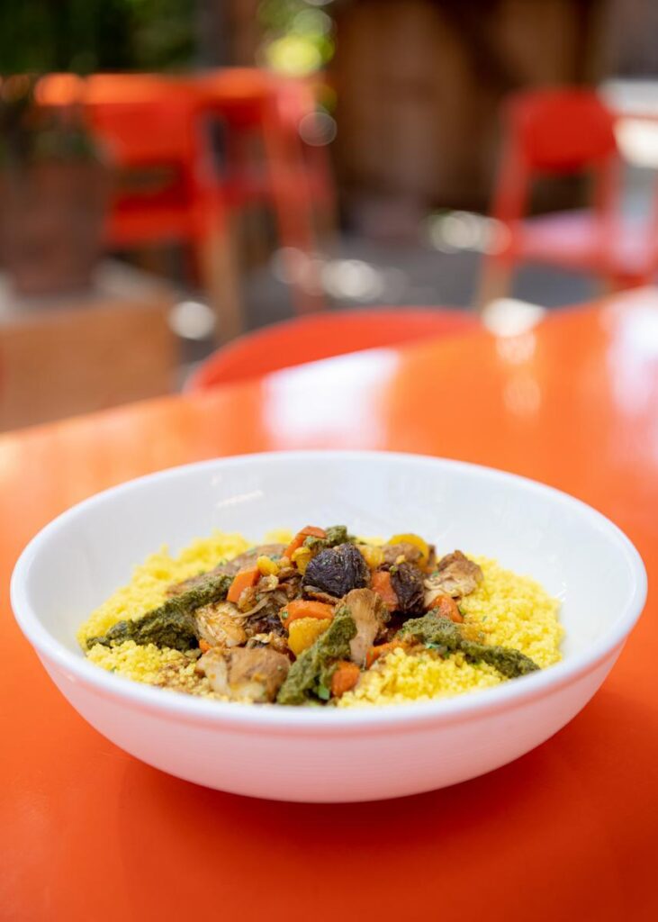 bowl of moroccon tagine on an orange table