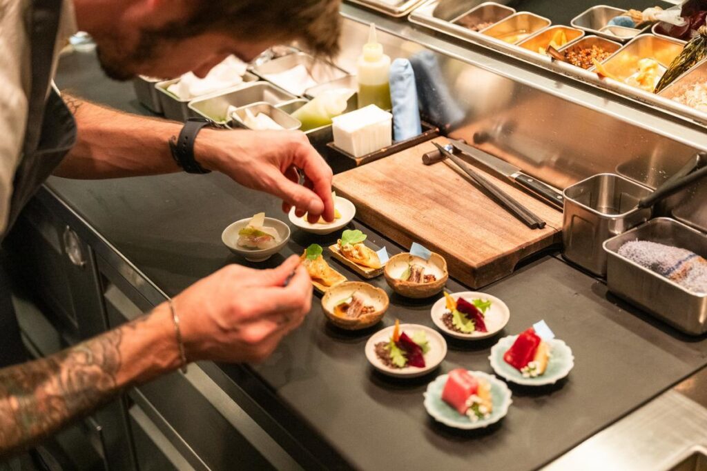chef plating small dishes at SingleThread