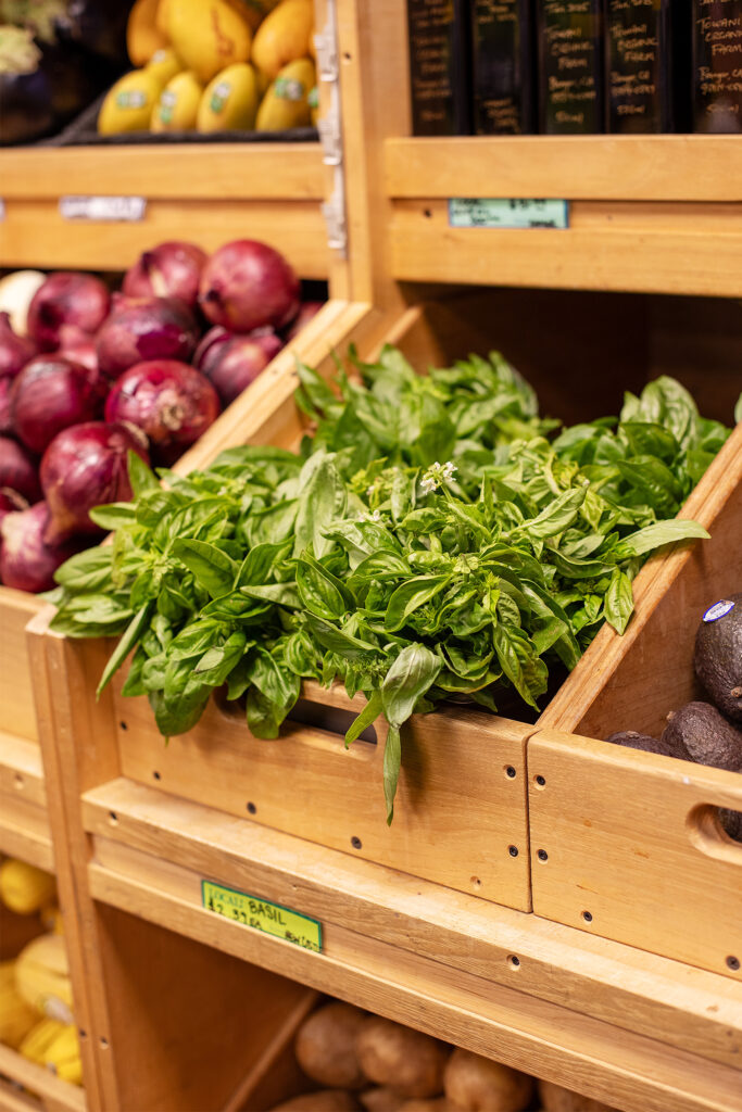 Wooden box of fresh basil