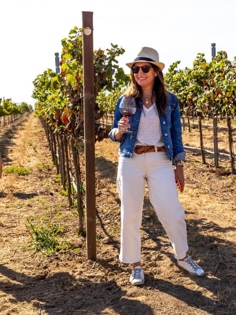 woman drinking wine at in the fields at talbott