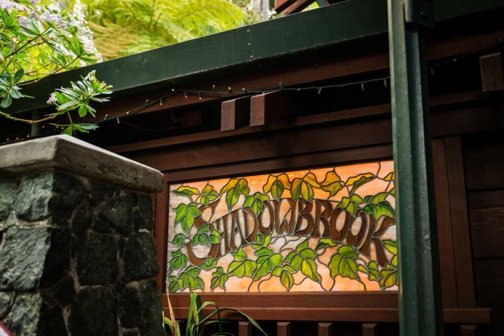 stained glass sign at shadowbrook