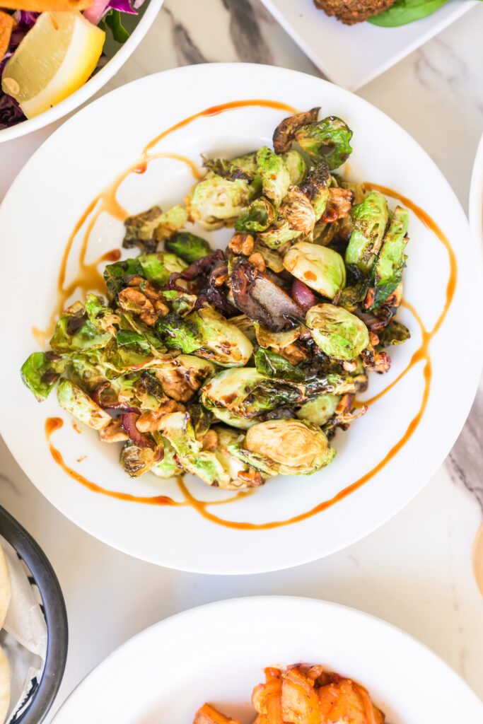 Plate of brussels sprouts with pomegranate molasses