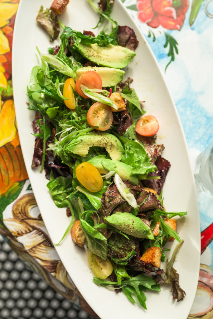 One of the featured salads topped with Garlic Vinaigrette at The Stinking Rose