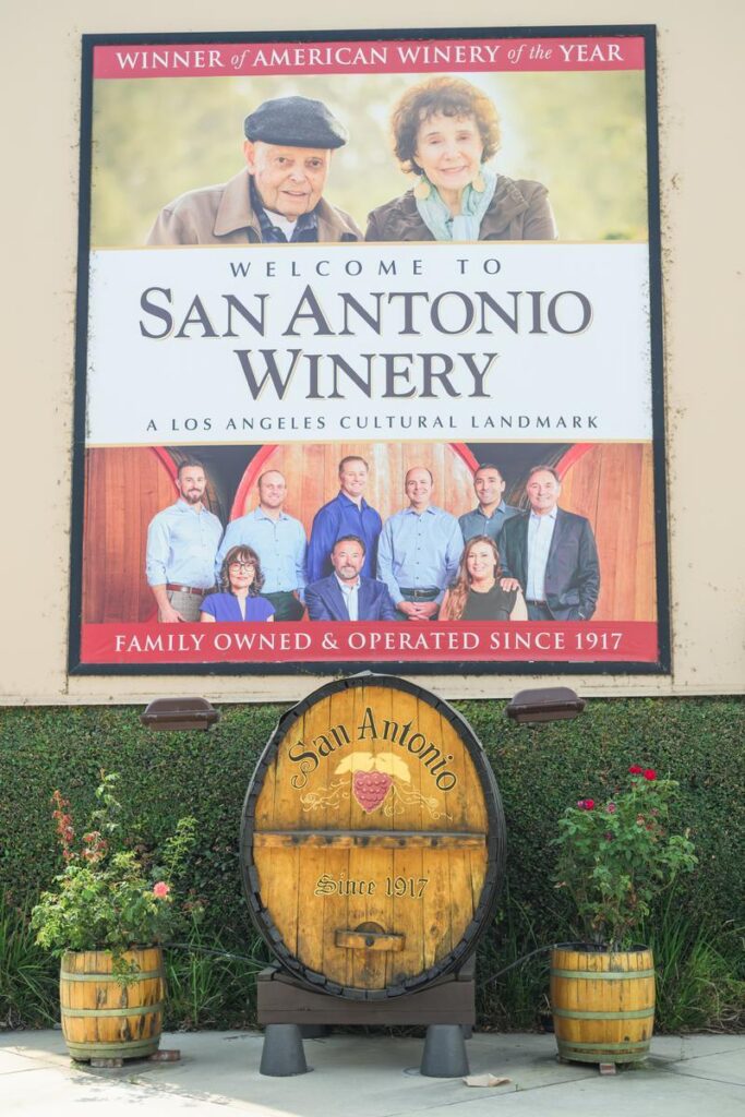 sign with photos of family members at San Antonio winery