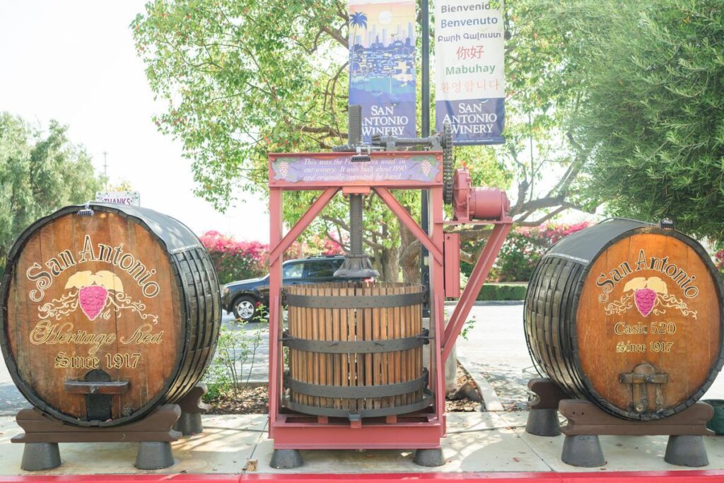 original wine press and barrels from san antonio winery
