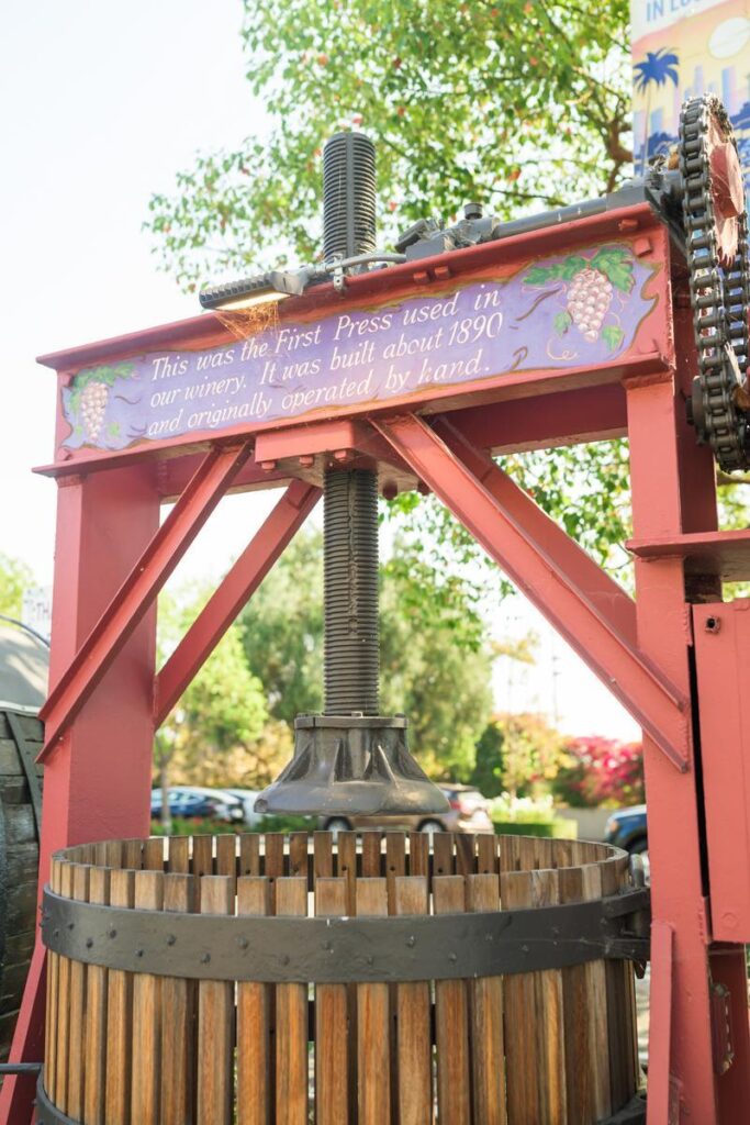original wine press and barrels from san antonio winery
