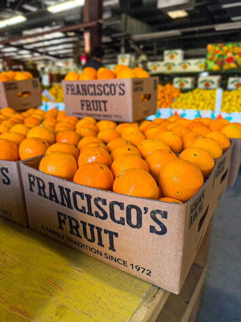 Fruit stands along highway 126 - a box of oranges