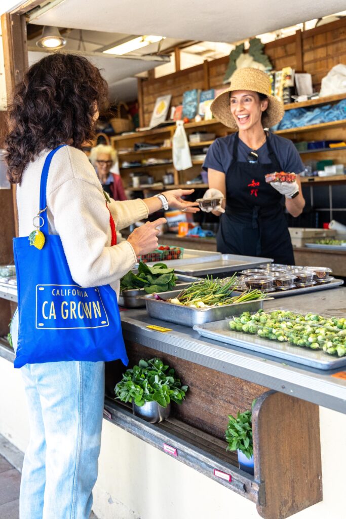 Aida Mollenkamp purchasing produce at Chino Family Farms